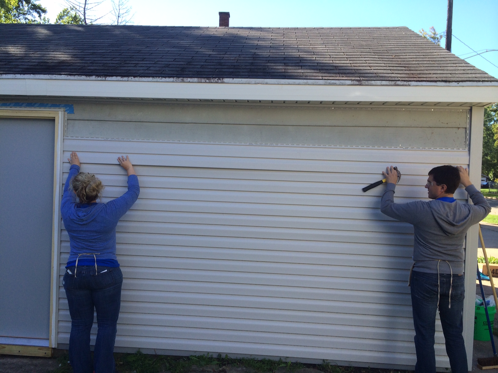 siding--finishing up wide shot +