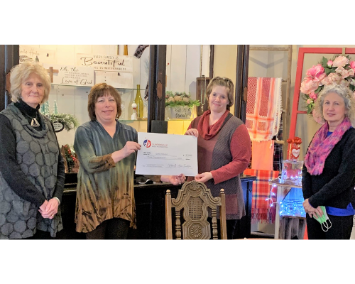 Safe Haven Domestic Abuse Support Center Family Services Advocate Kandi Krueger (third, L to R) accepts a $3,000 grant from past Clintonville Area Board member Kathy Akey, and current Board members Sue Aschliman and Joy Krubsack (L to R).